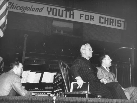 Youth leaders Doug Fisher, Dr. John Linton and Robert A. Cook attending a Youth For Christ rally